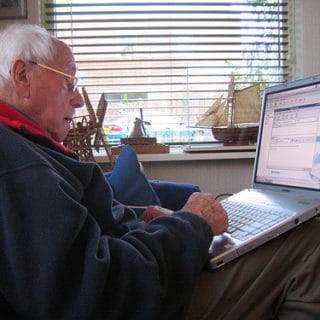 Senior man working remotely