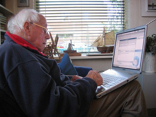 Senior man working remotely