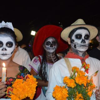 Crowd with skull masks in halloween