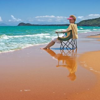 woman in a chair on a beach