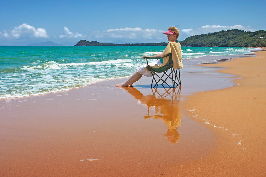 woman in a chair on a beach
